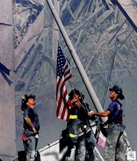 911 firefighters-raise-flag